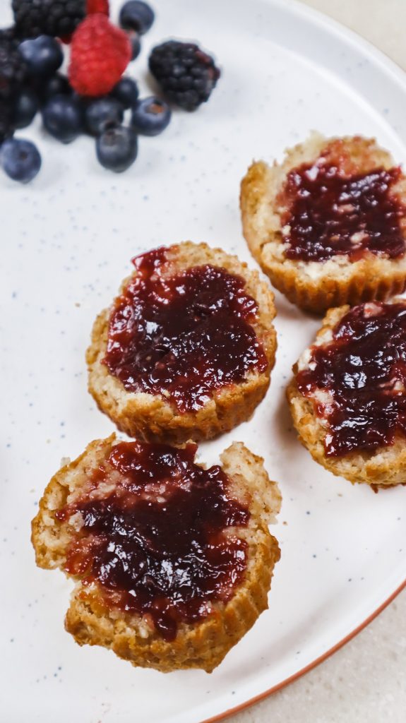 cinnamon breakfast biscuits topped with blackberry jam
